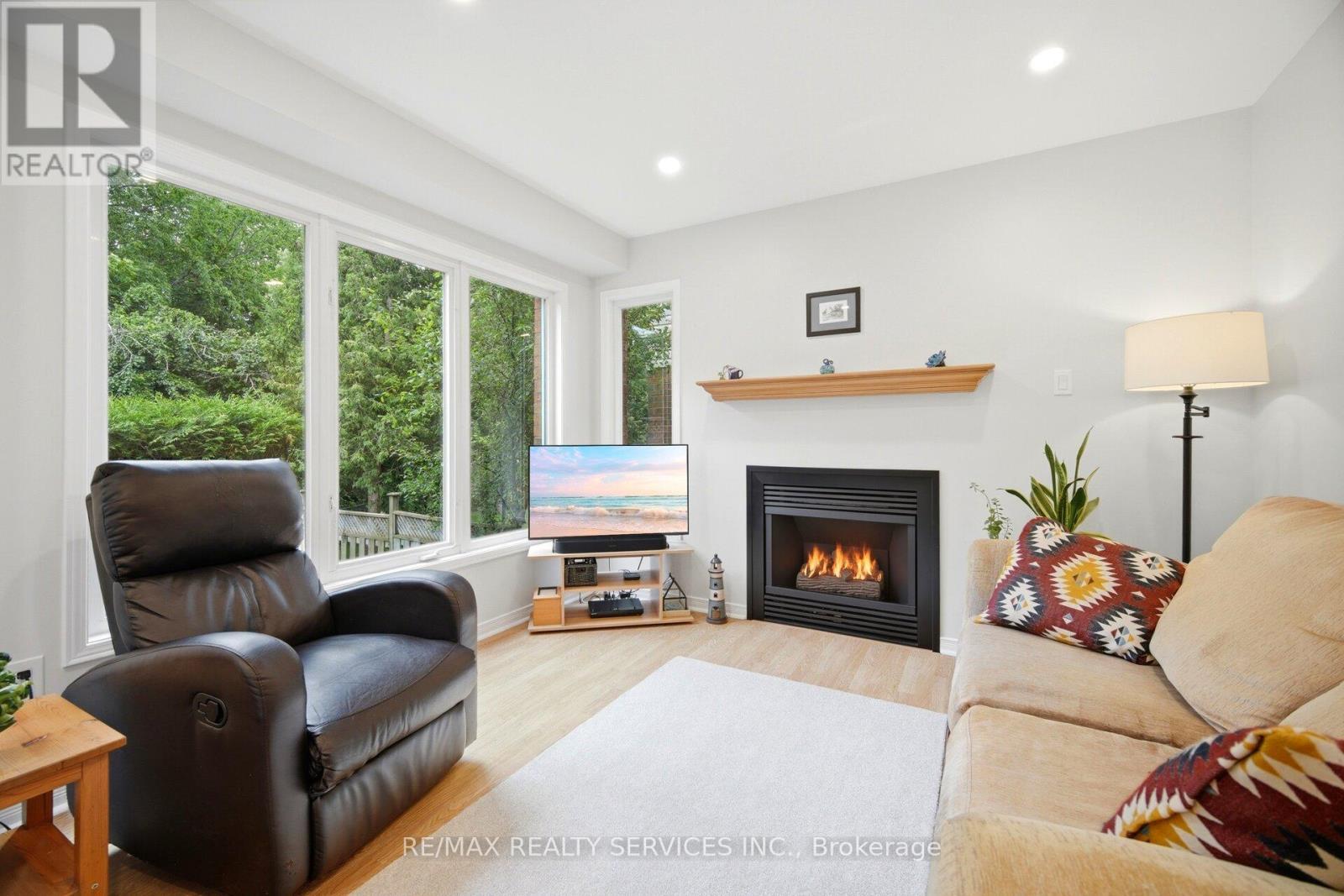 38 Furrows End, Brampton, ON - Indoor Photo Showing Living Room With Fireplace