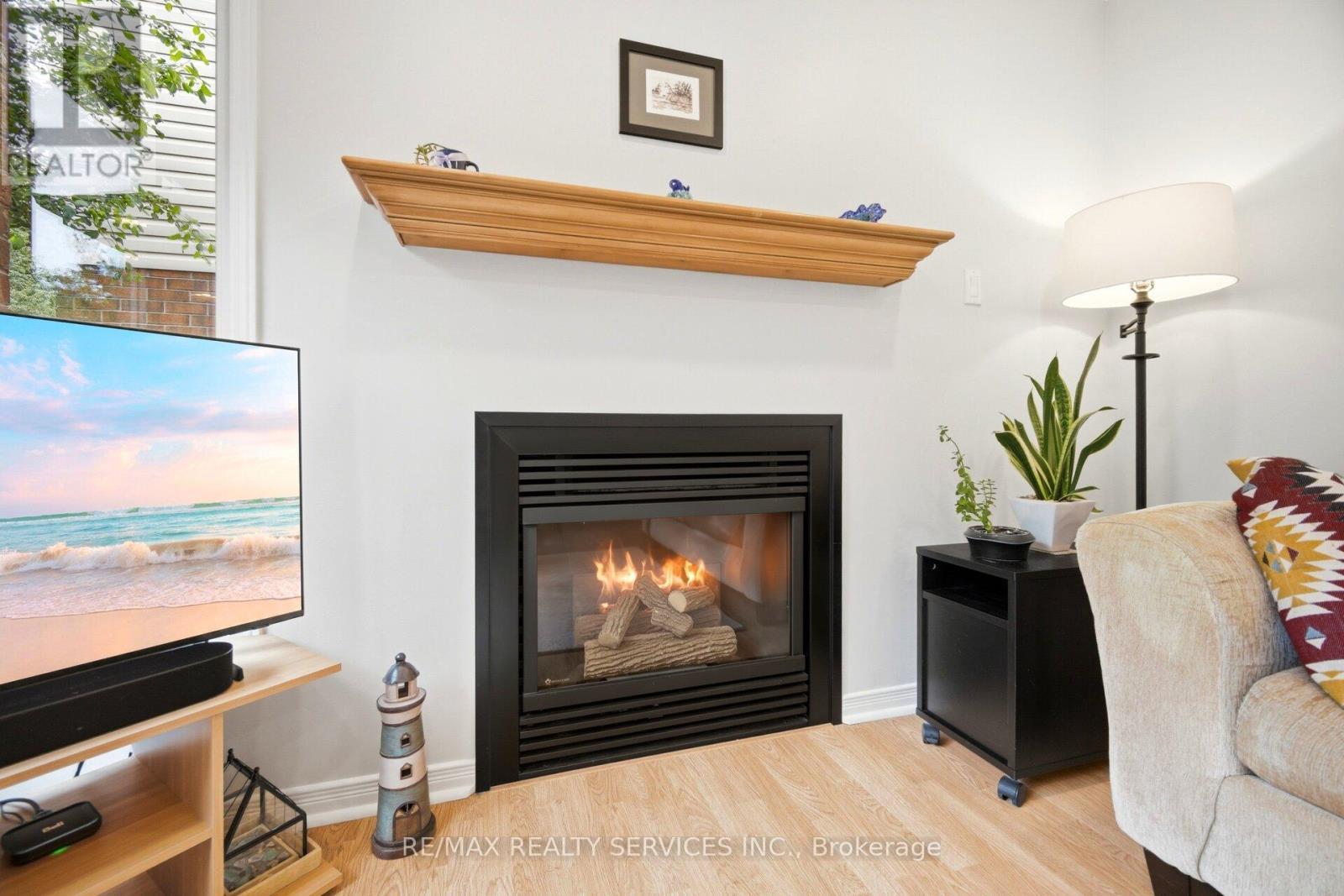38 Furrows End, Brampton, ON - Indoor Photo Showing Living Room With Fireplace