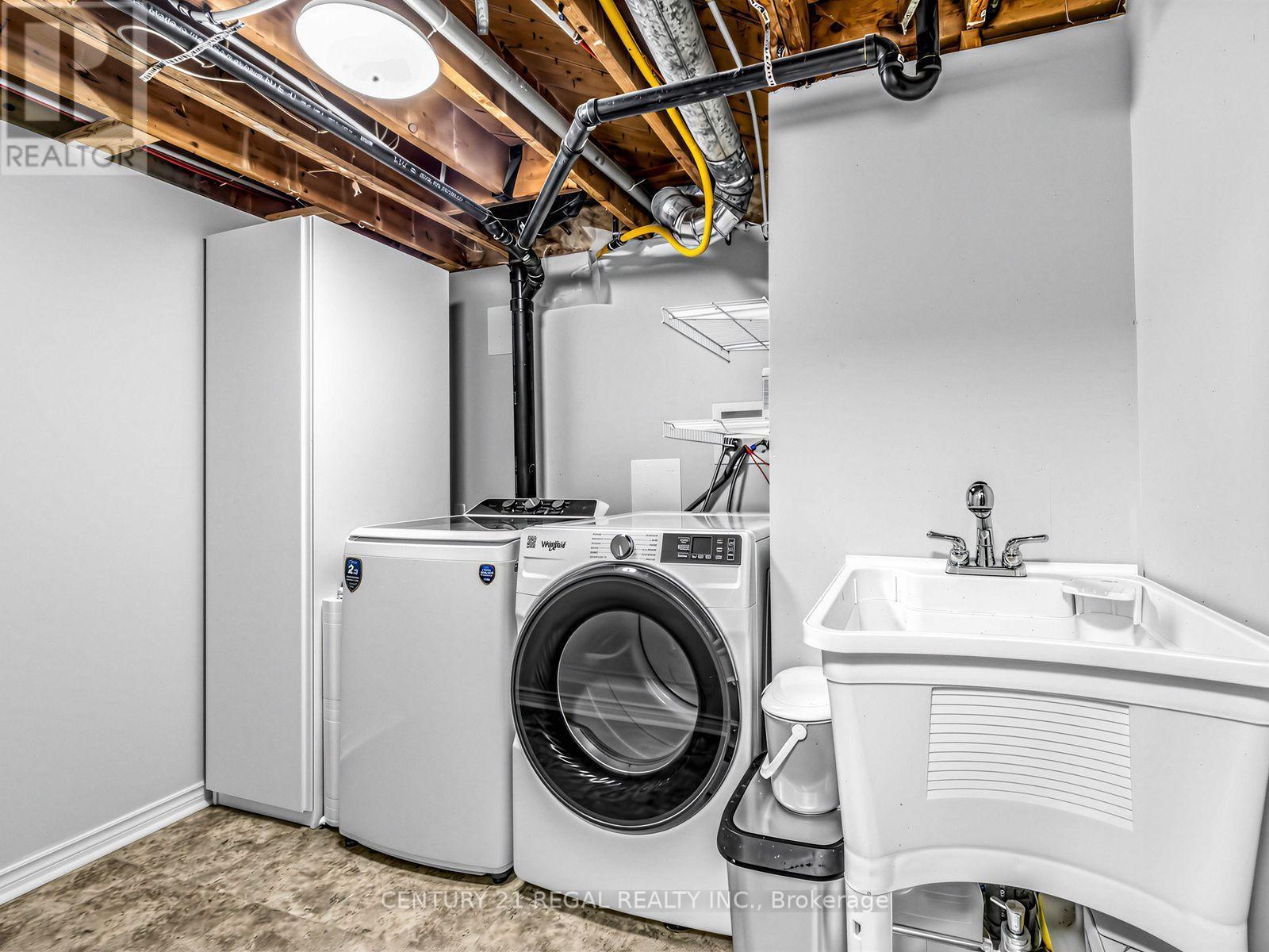 281 Thistle Down Boulevard, Toronto, ON - Indoor Photo Showing Laundry Room