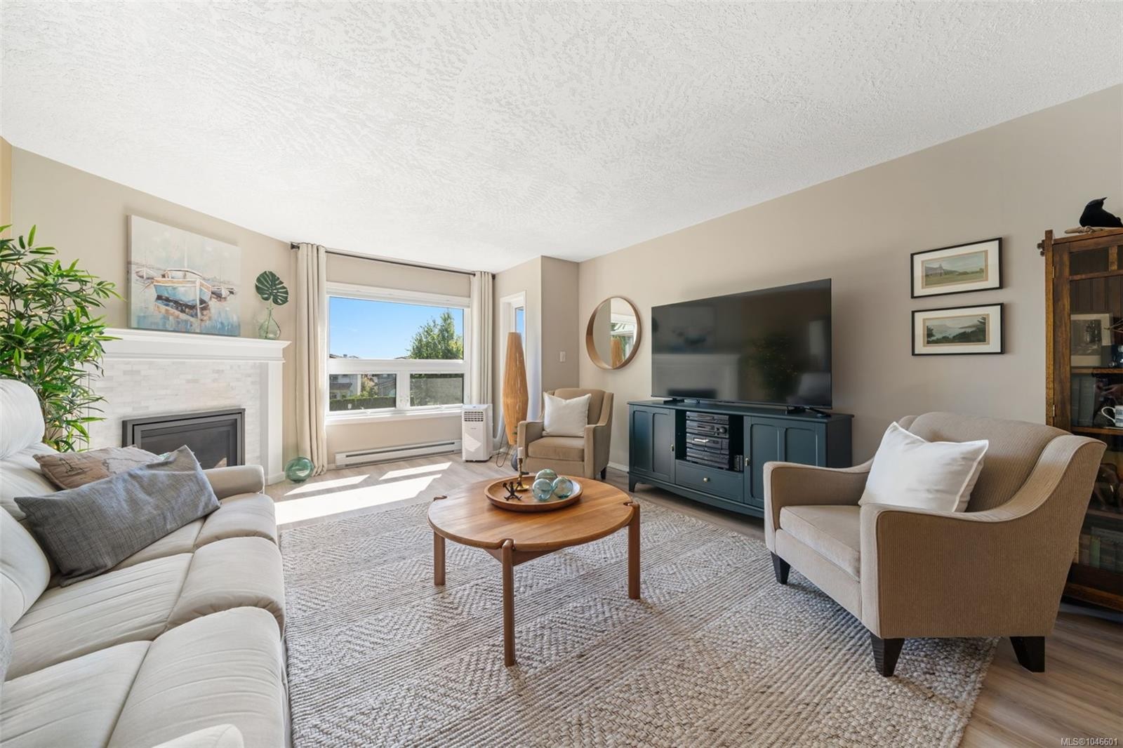#310-9650 First St, Sidney, BC - Indoor Photo Showing Living Room With Fireplace