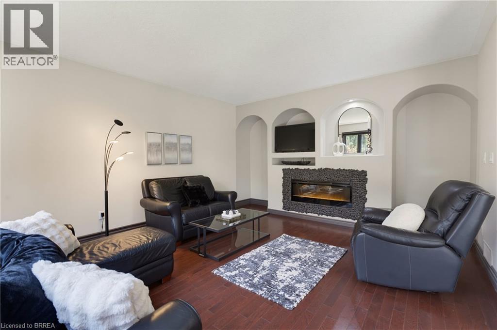 141 Falconridge Drive, Kitchener, ON - Indoor Photo Showing Living Room With Fireplace