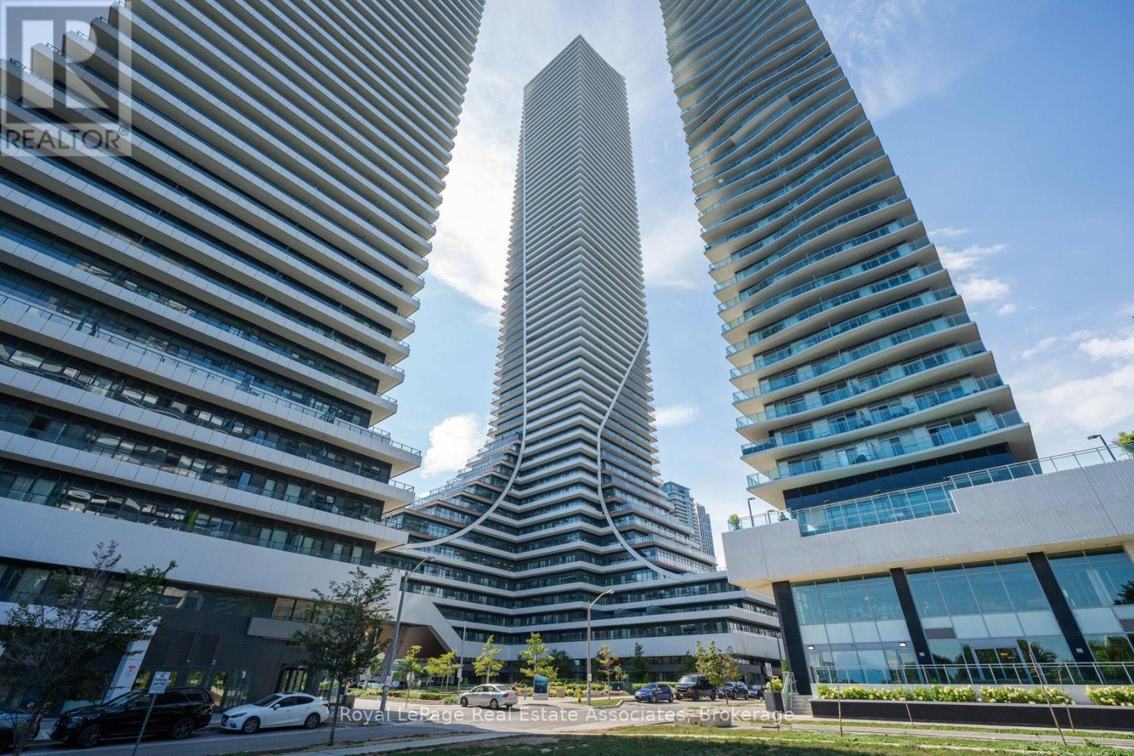 Exterior - 6104 - 30 Shore Breeze Drive, Toronto, ON - Outdoor With Balcony With Facade