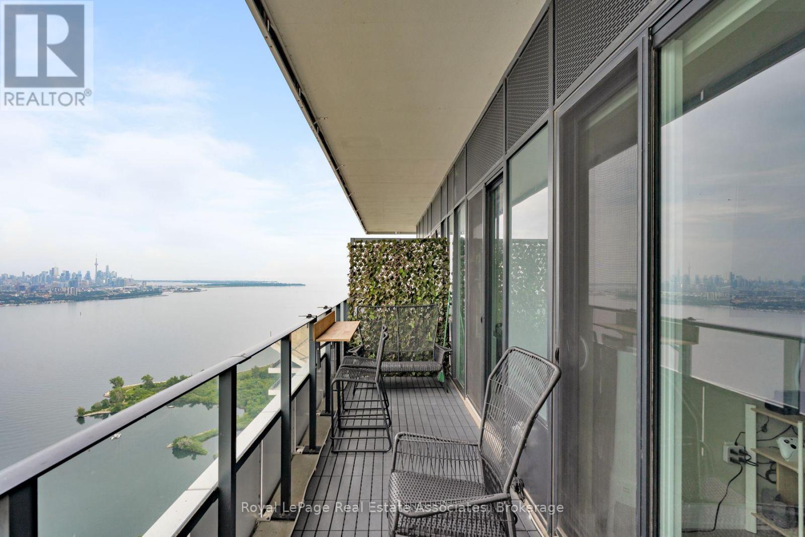 View - 6104 - 30 Shore Breeze Drive, Toronto, ON - Outdoor With Body Of Water With Balcony With Exterior