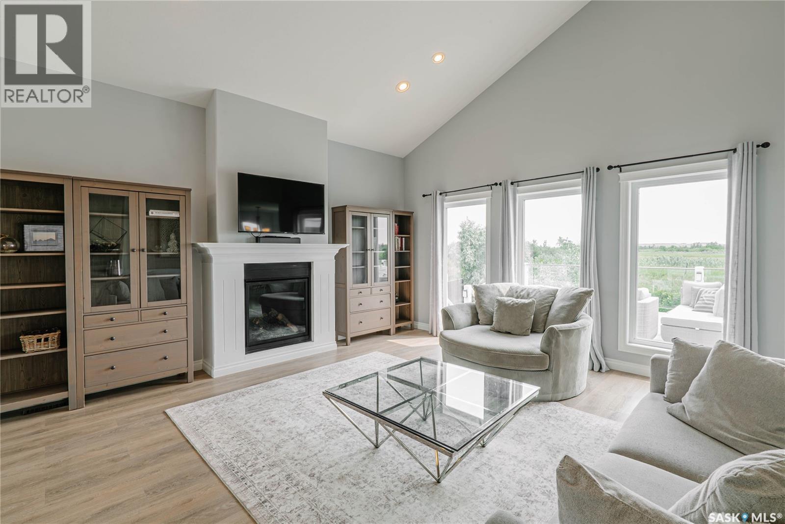 400 Stone Terrace, Martensville, SK - Indoor Photo Showing Living Room With Fireplace
