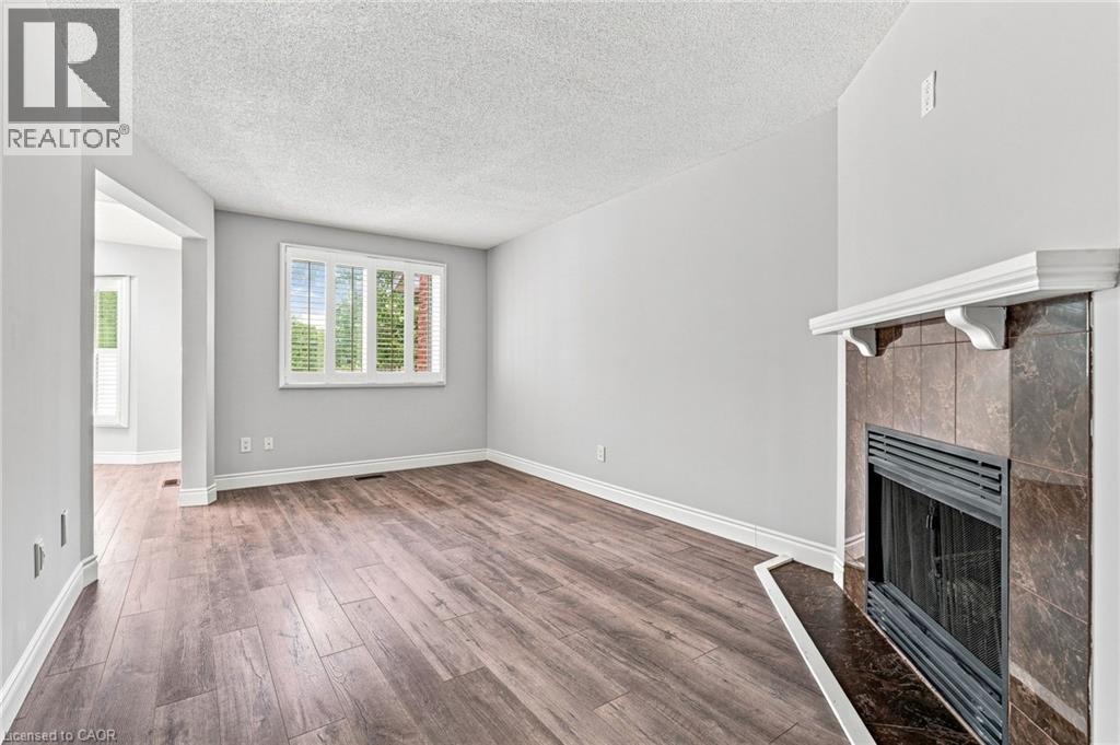 1 Perthshire Court, Hamilton, ON - Indoor Photo Showing Other Room With Fireplace