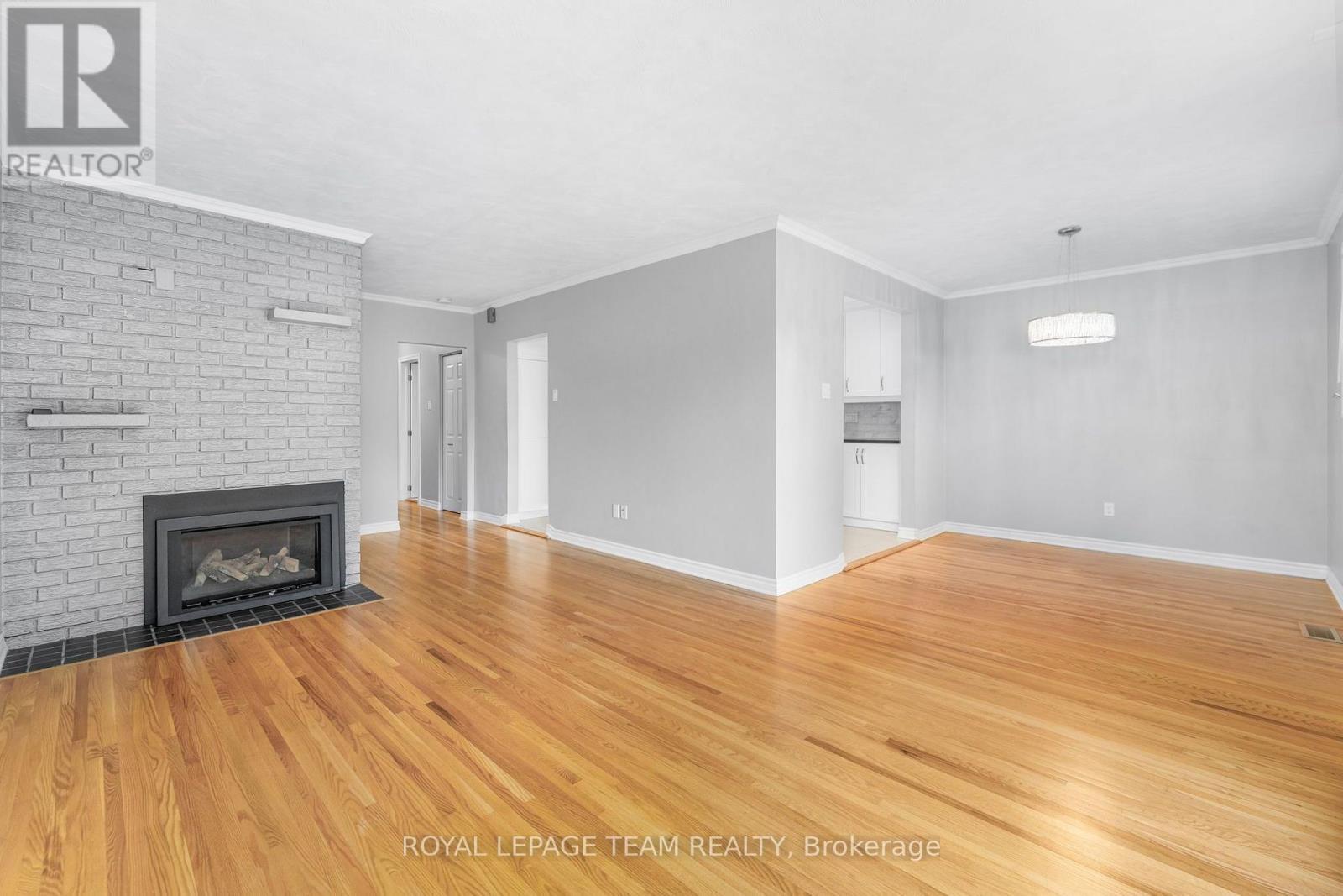 2349 Edwin Crescent, Ottawa, ON - Indoor Photo Showing Other Room With Fireplace