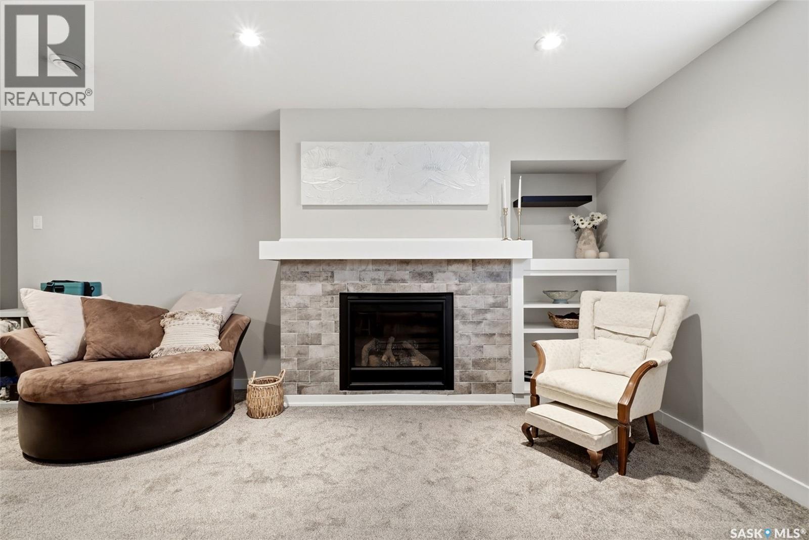 5565 Norseman Crescent, Regina, SK - Indoor Photo Showing Living Room With Fireplace