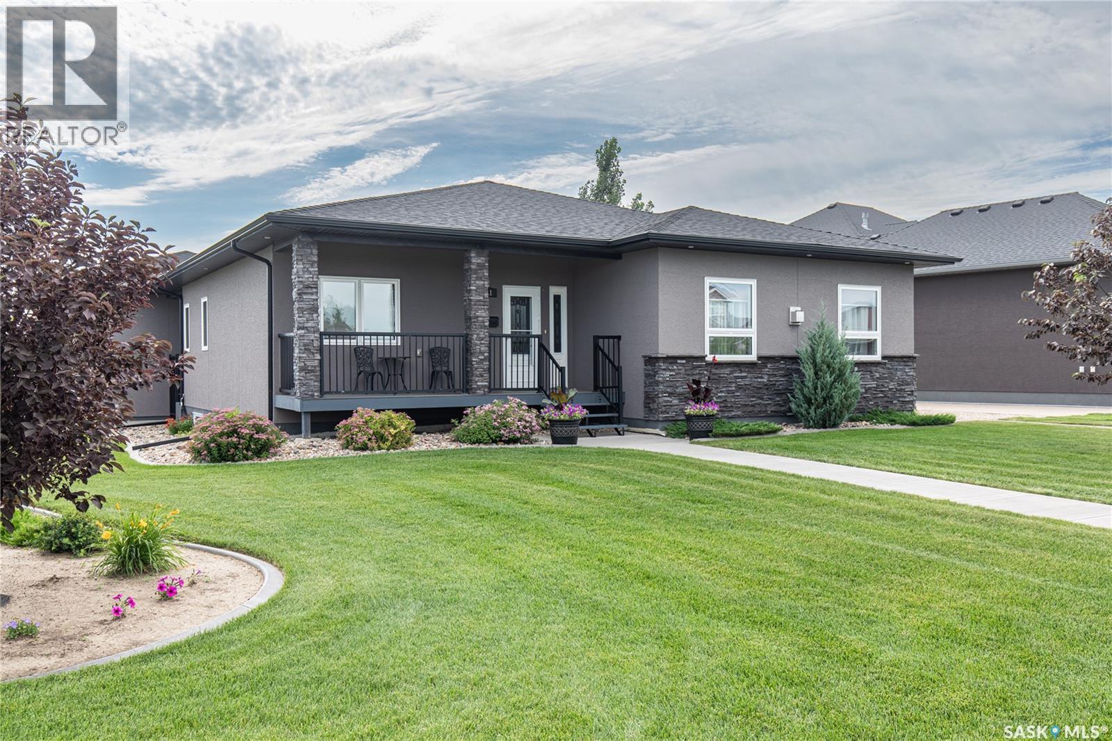111 Iron Bridge Drive, Moose Jaw, SK - Outdoor With Deck Patio Veranda