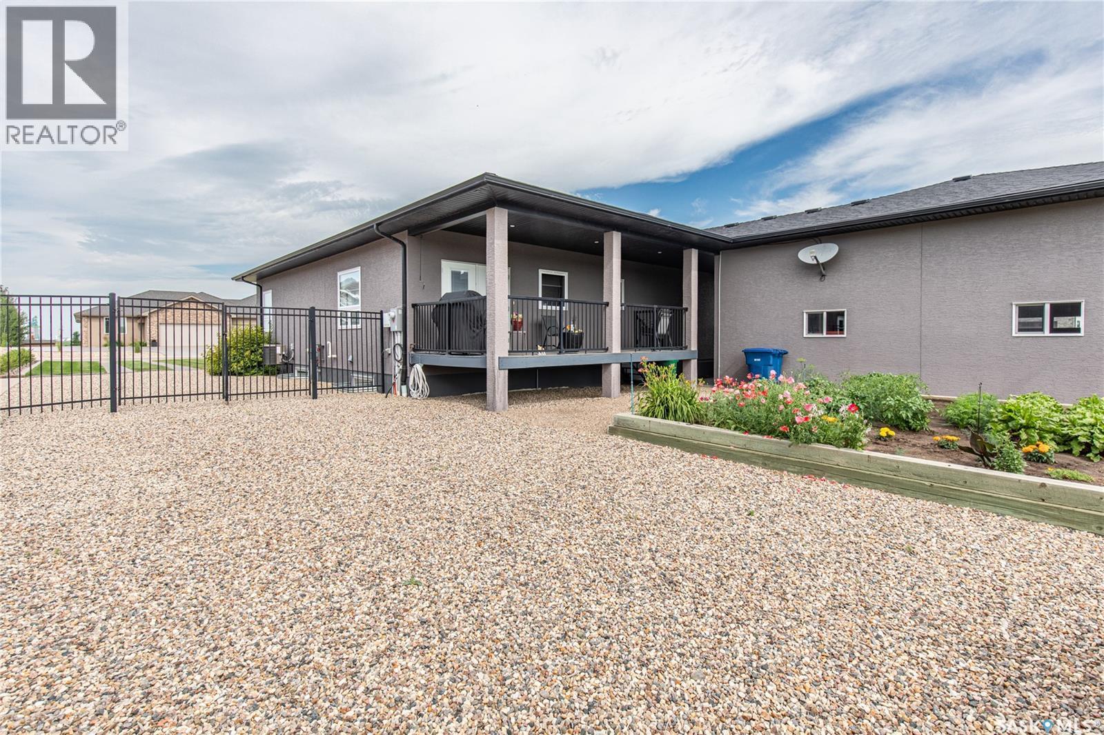 111 Iron Bridge Drive, Moose Jaw, SK - Outdoor With Deck Patio Veranda
