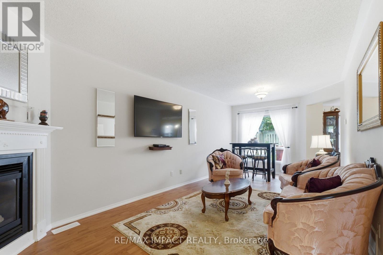 106 Mcfeeters Crescent, Clarington, ON - Indoor Photo Showing Living Room With Fireplace