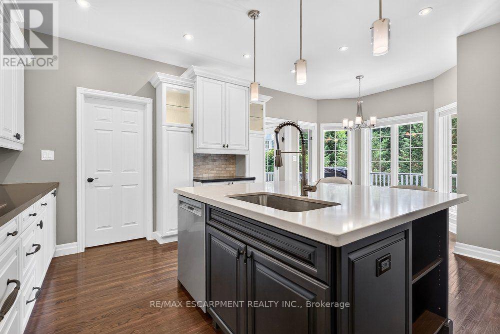 Island with seating - 110 Concession 11 Road E, Hamilton, ON - Indoor Photo Showing Kitchen With Upgraded Kitchen