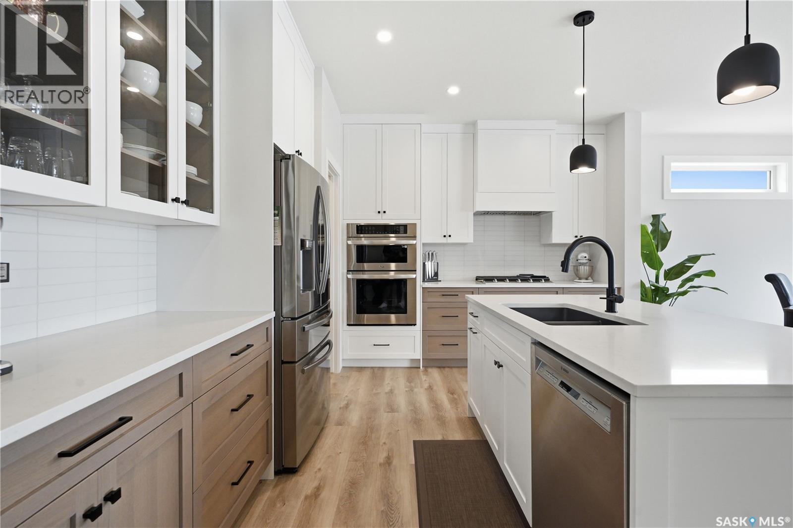 246 Prasad Manor, Saskatoon, SK - Indoor Photo Showing Kitchen With Stainless Steel Kitchen With Upgraded Kitchen