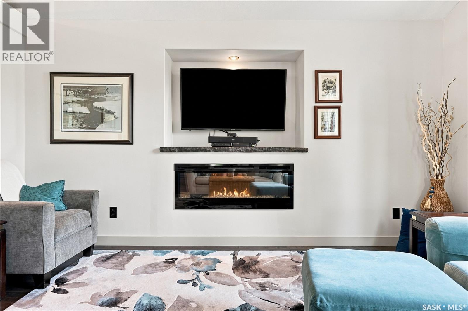 2786 Sunninghill Crescent, Regina, SK - Indoor Photo Showing Living Room With Fireplace