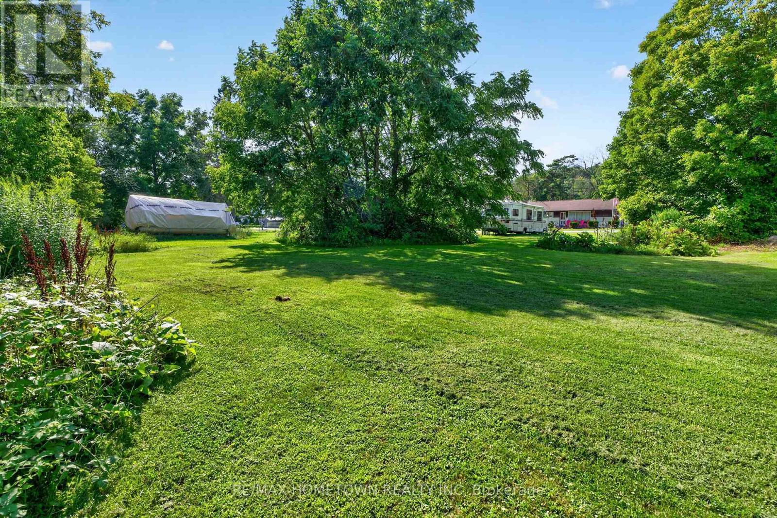 Plenty of green space in a family friendly village - 116 Mill Creek Drive, Rideau Lakes, ON