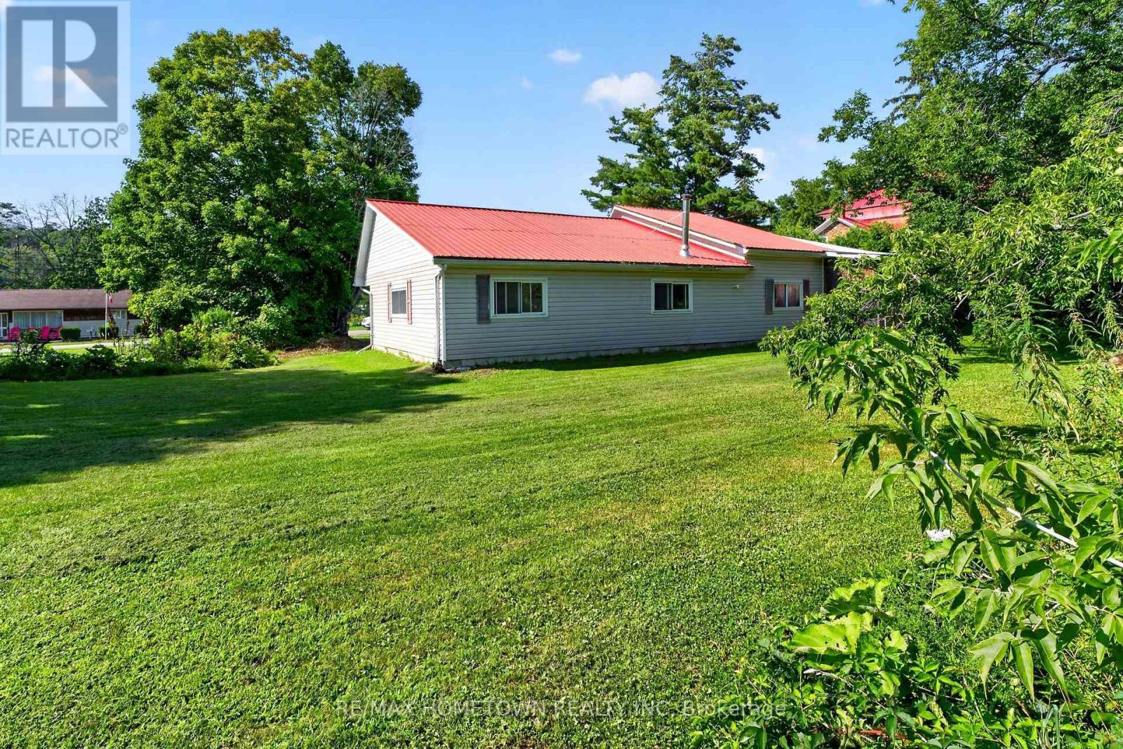 Backyard behind the garge - 116 Mill Creek Drive, Rideau Lakes, ON