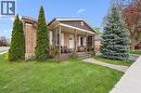 Brick exterior with a covered front porch and a paved walkway - 27 Roseview Avenue, Cambridge, ON  - Outdoor With Deck Patio Veranda 