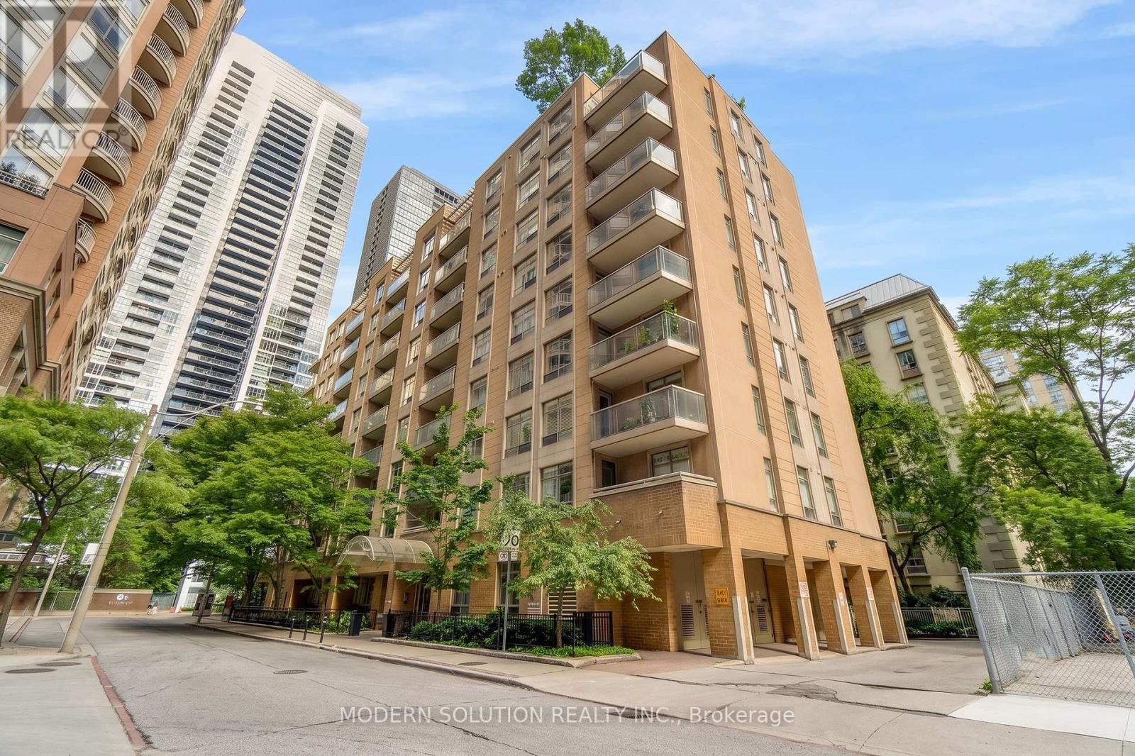 201 - 99 Hayden Street, Toronto, ON - Outdoor With Balcony With Facade
