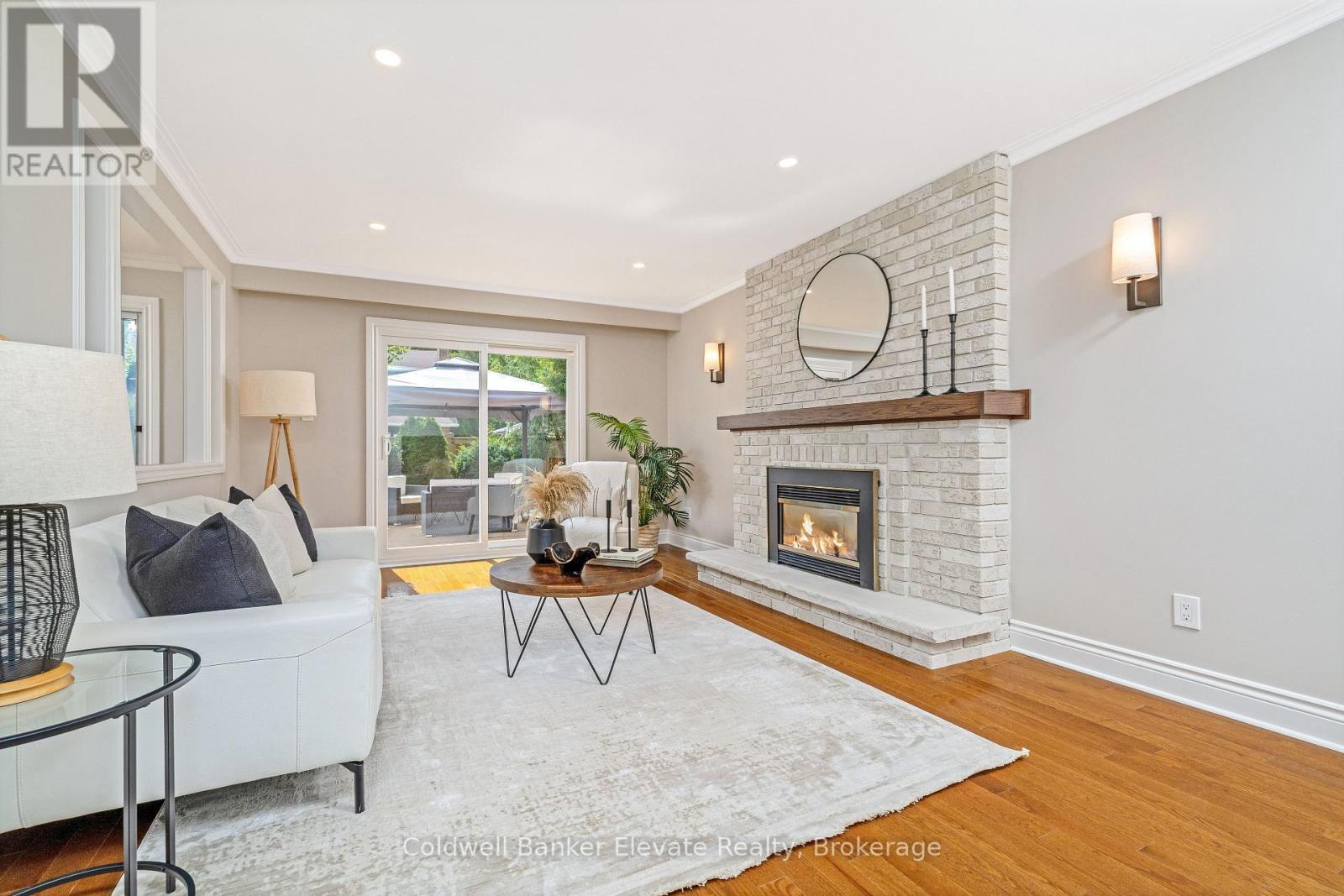 1677 Sherwood Forrest Circle, Mississauga, ON - Indoor Photo Showing Living Room With Fireplace