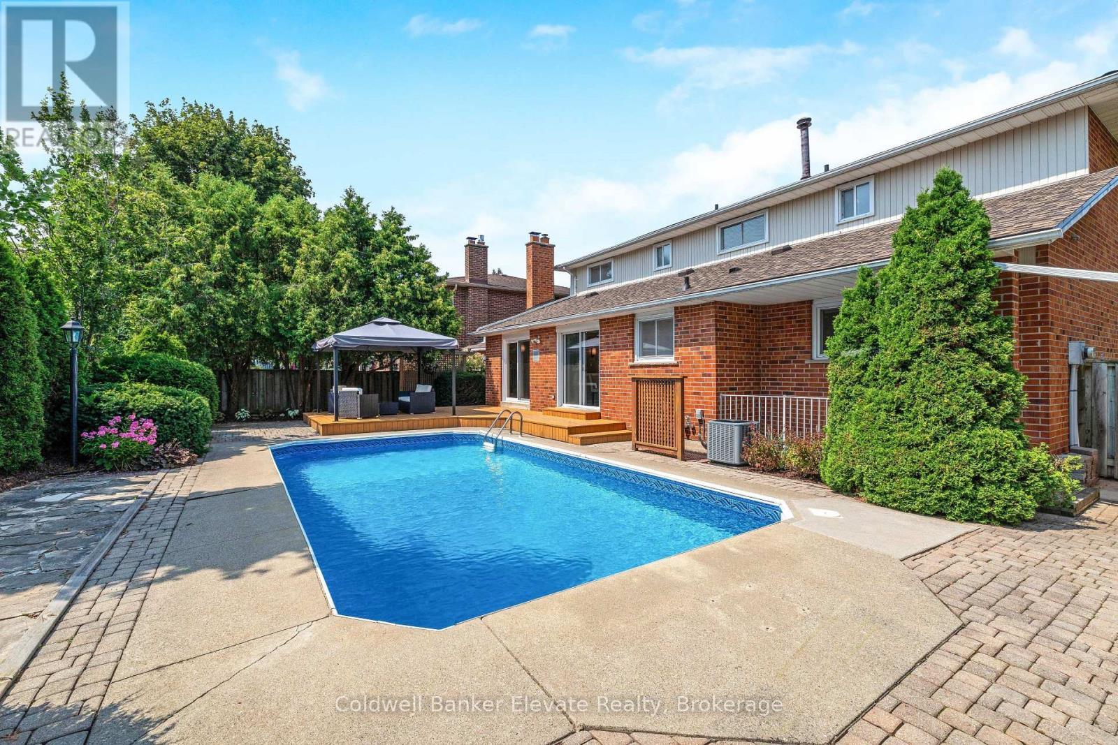 1677 Sherwood Forrest Circle, Mississauga, ON - Outdoor With In Ground Pool With Deck Patio Veranda