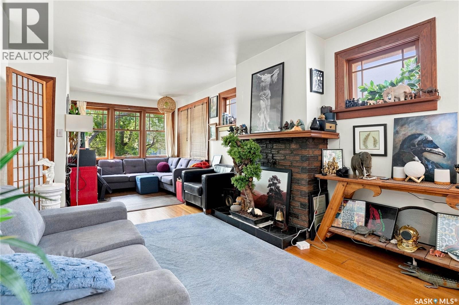 3324 College Avenue, Regina, SK - Indoor Photo Showing Living Room With Fireplace