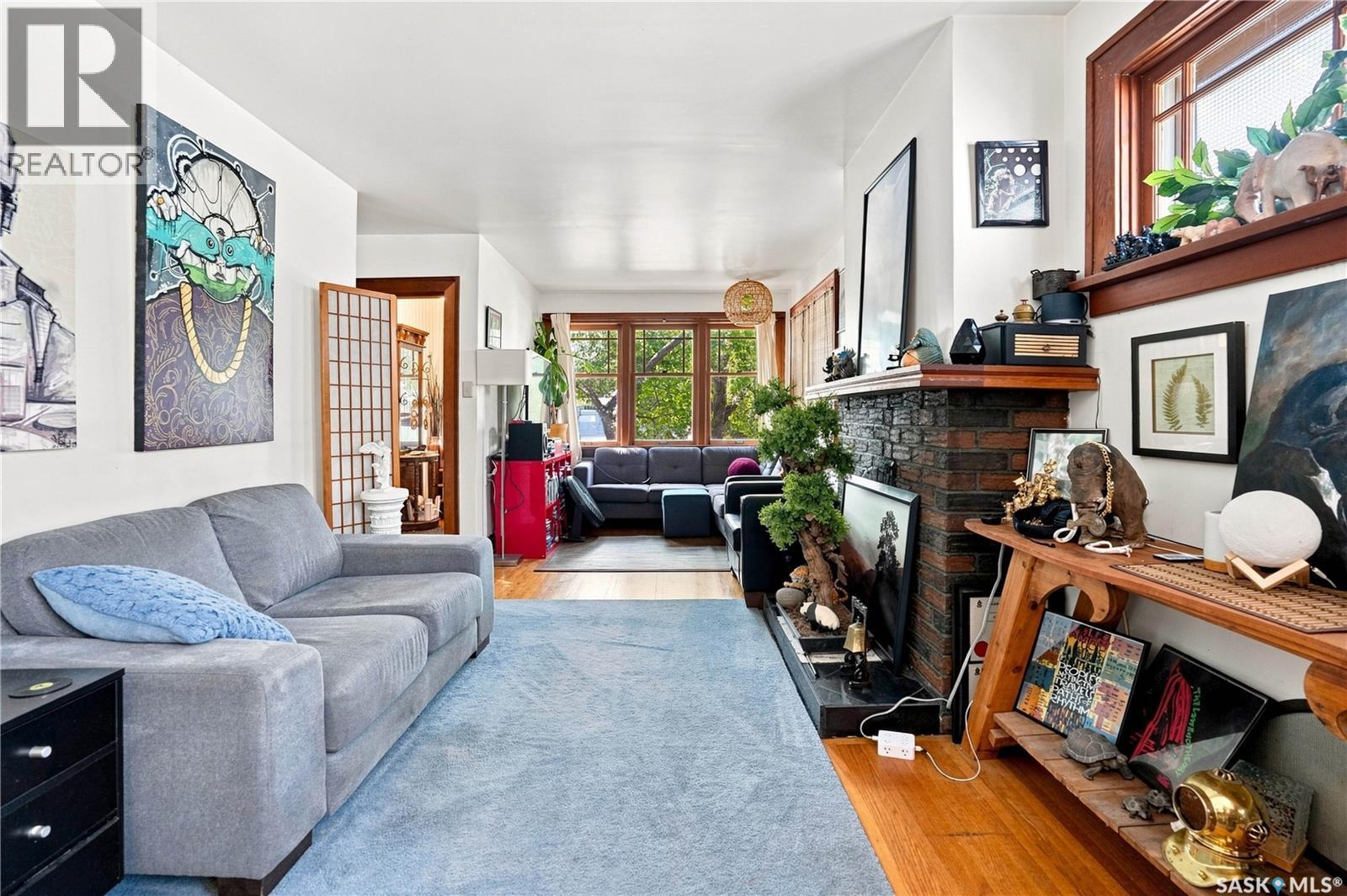 3324 College Avenue, Regina, SK - Indoor Photo Showing Other Room With Fireplace