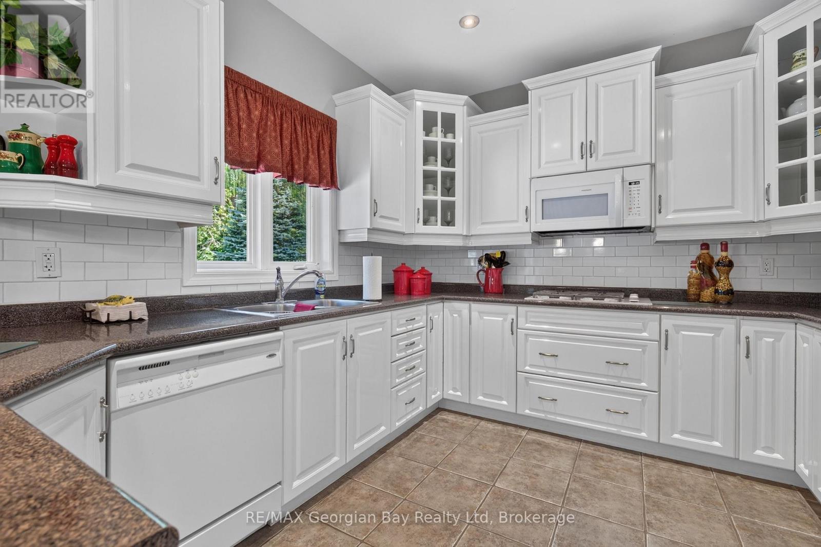 1339 Tiny Beaches Road N, Tiny, ON - Indoor Photo Showing Kitchen With Double Sink