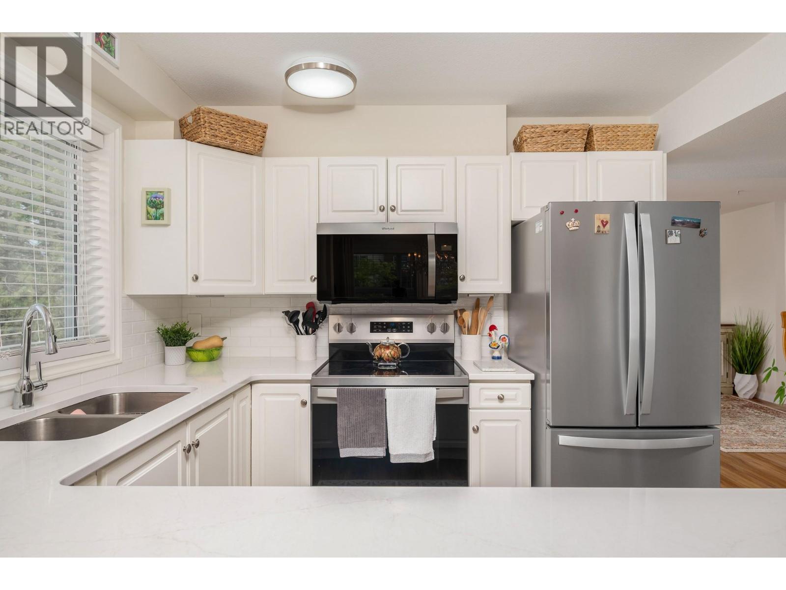 3301 Centennial Drive Unit# 309, Vernon, BC - Indoor Photo Showing Kitchen With Double Sink