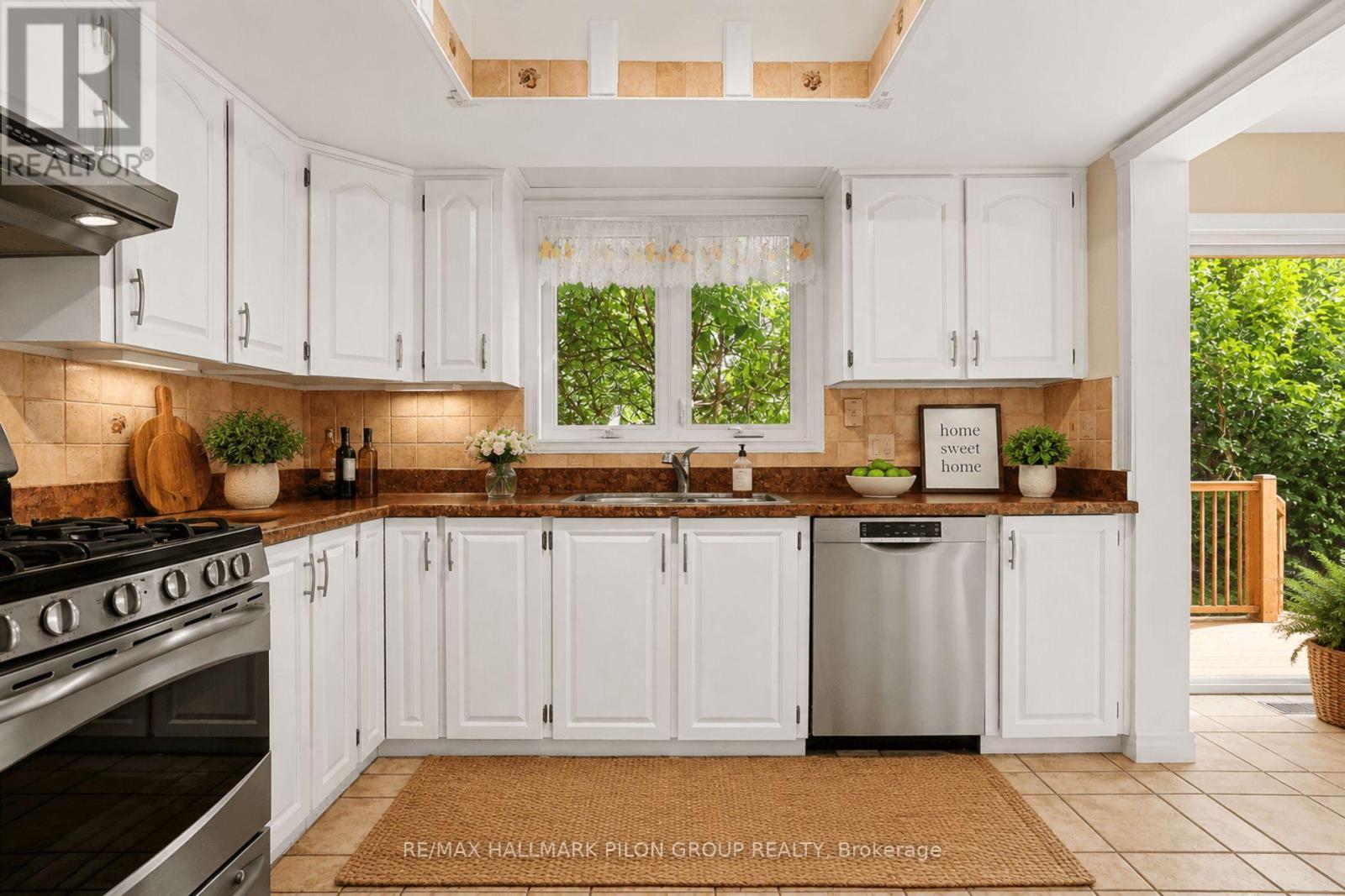 Virtually Staged - 182 Twyford Street, Ottawa, ON - Indoor Photo Showing Kitchen With Double Sink
