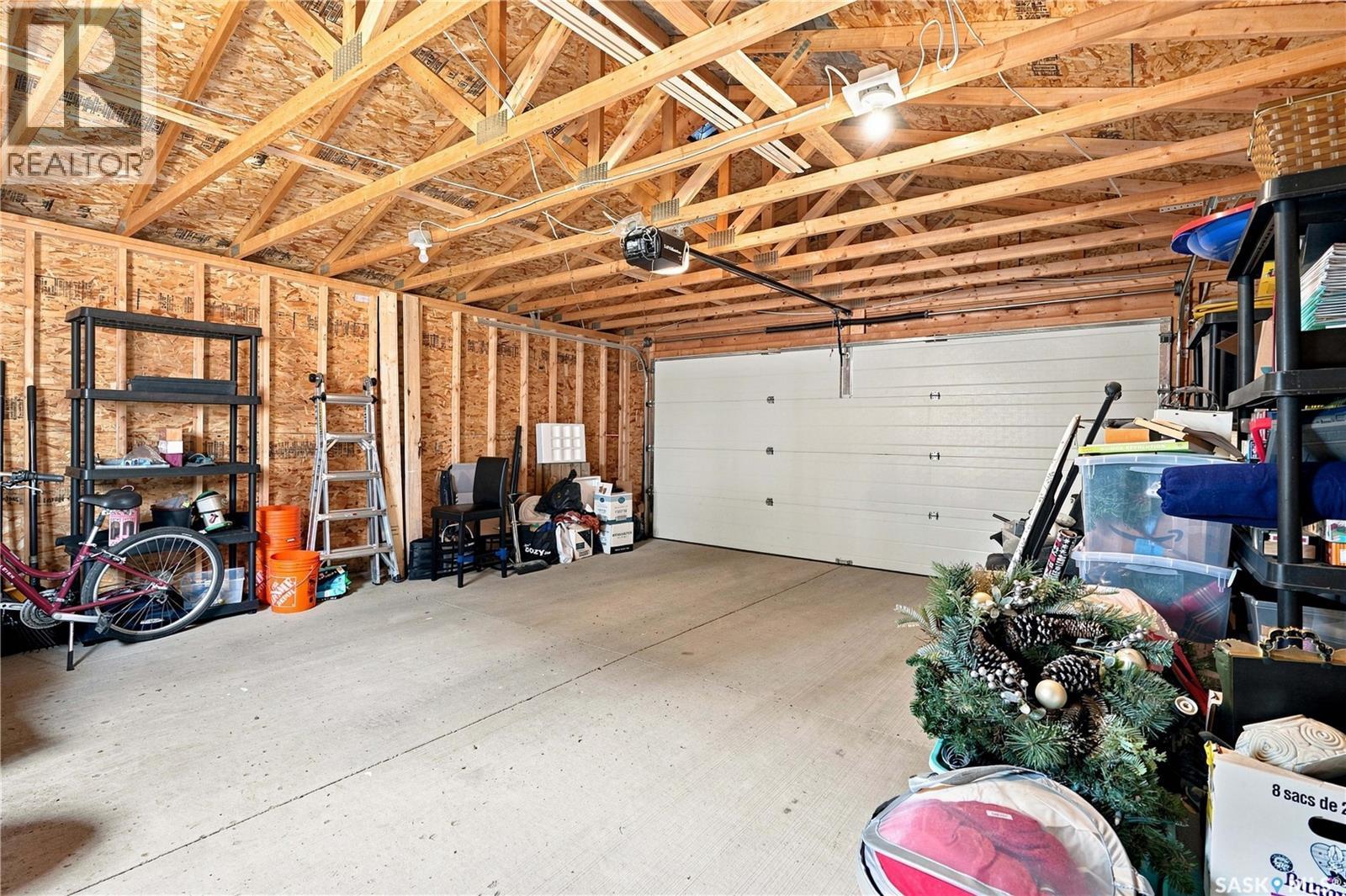 255 Newton Link, Saskatoon, SK - Indoor Photo Showing Garage