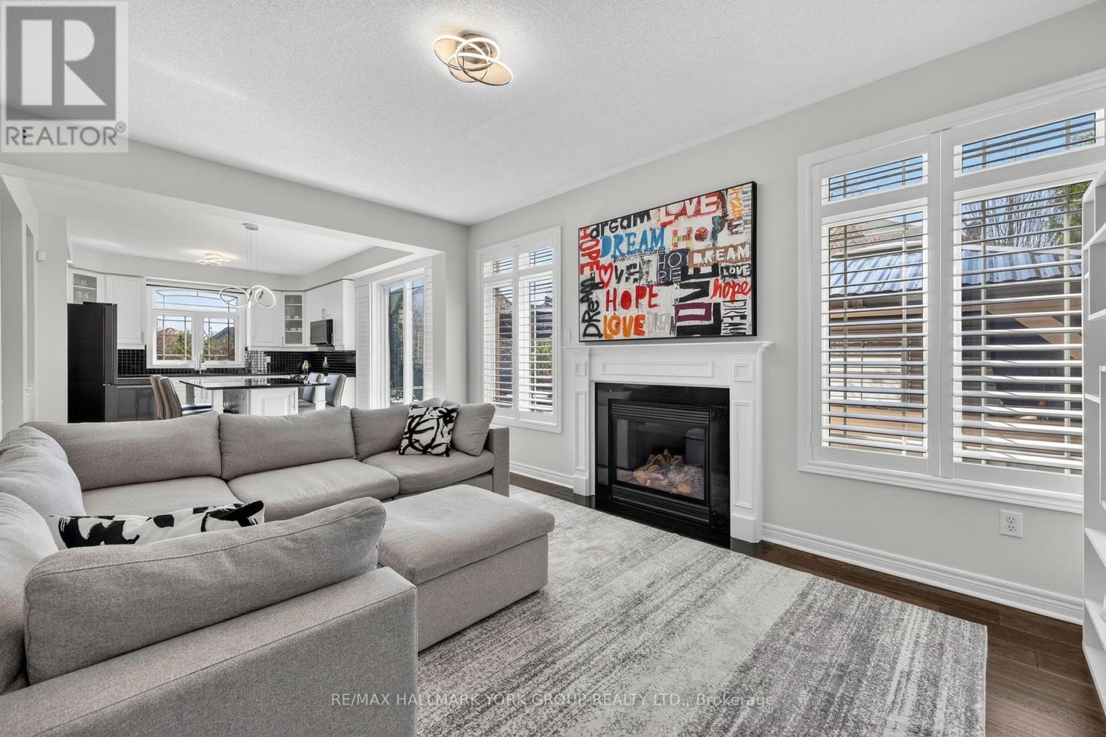 75 Mclarty Gate, Aurora, ON - Indoor Photo Showing Living Room With Fireplace