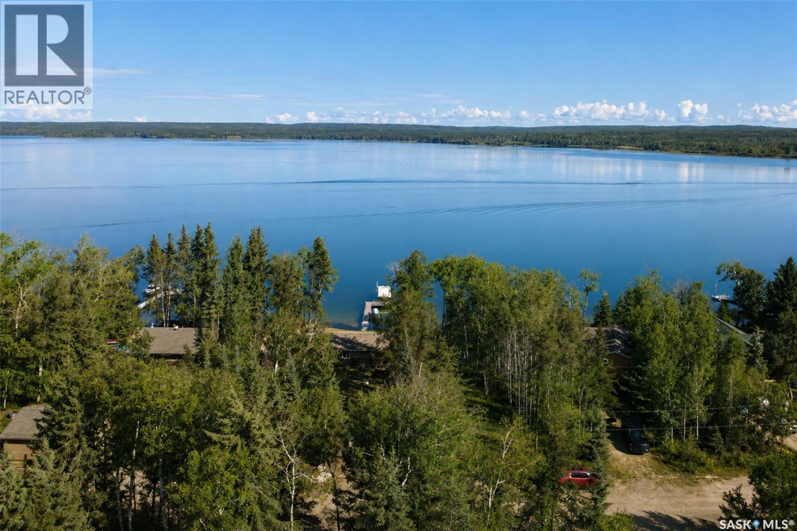 303 Christel Crescent, Lac Des Îles, SK - Outdoor With Body Of Water With View
