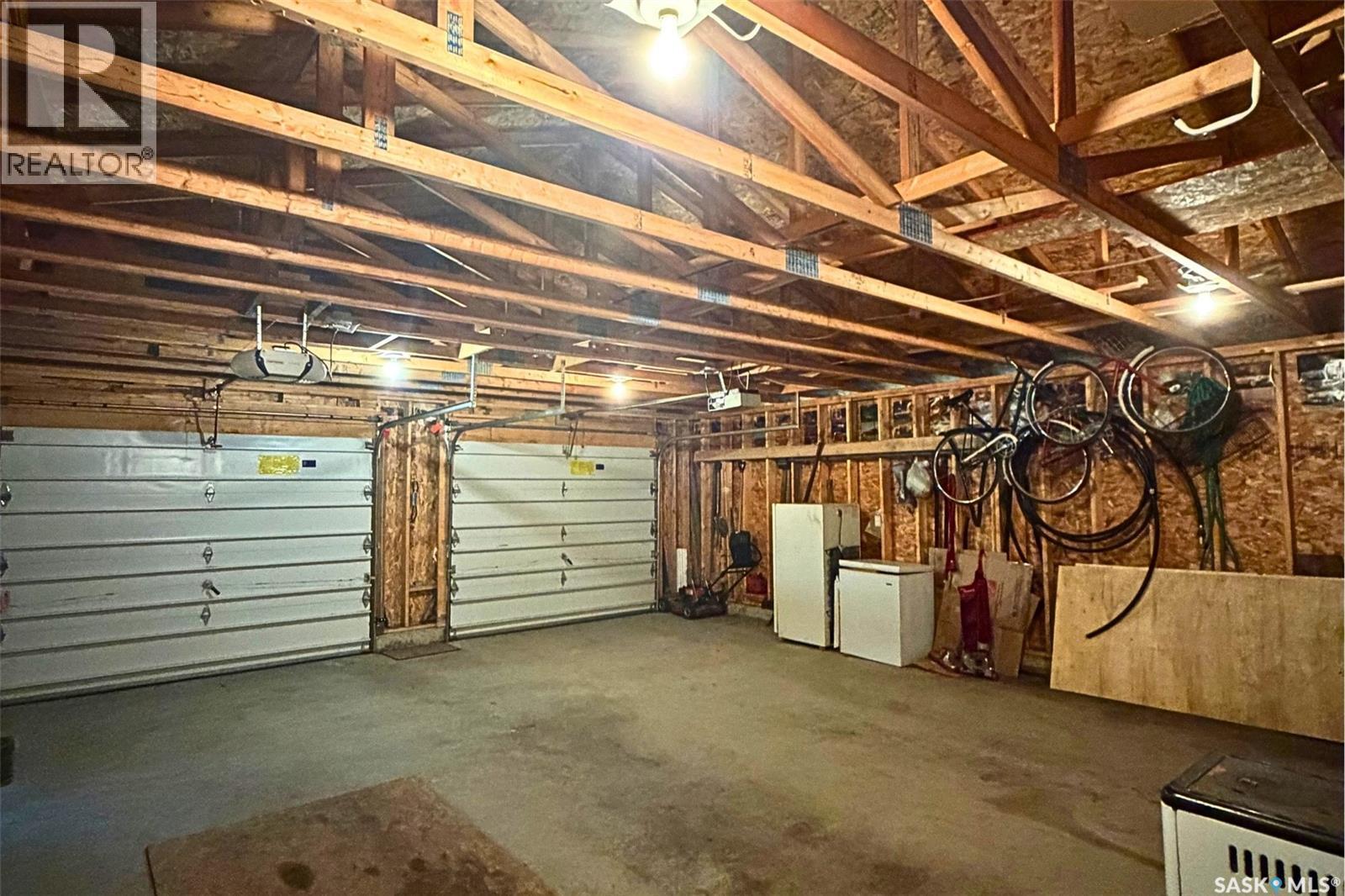303 Christel Crescent, Lac Des Îles, SK - Indoor Photo Showing Garage