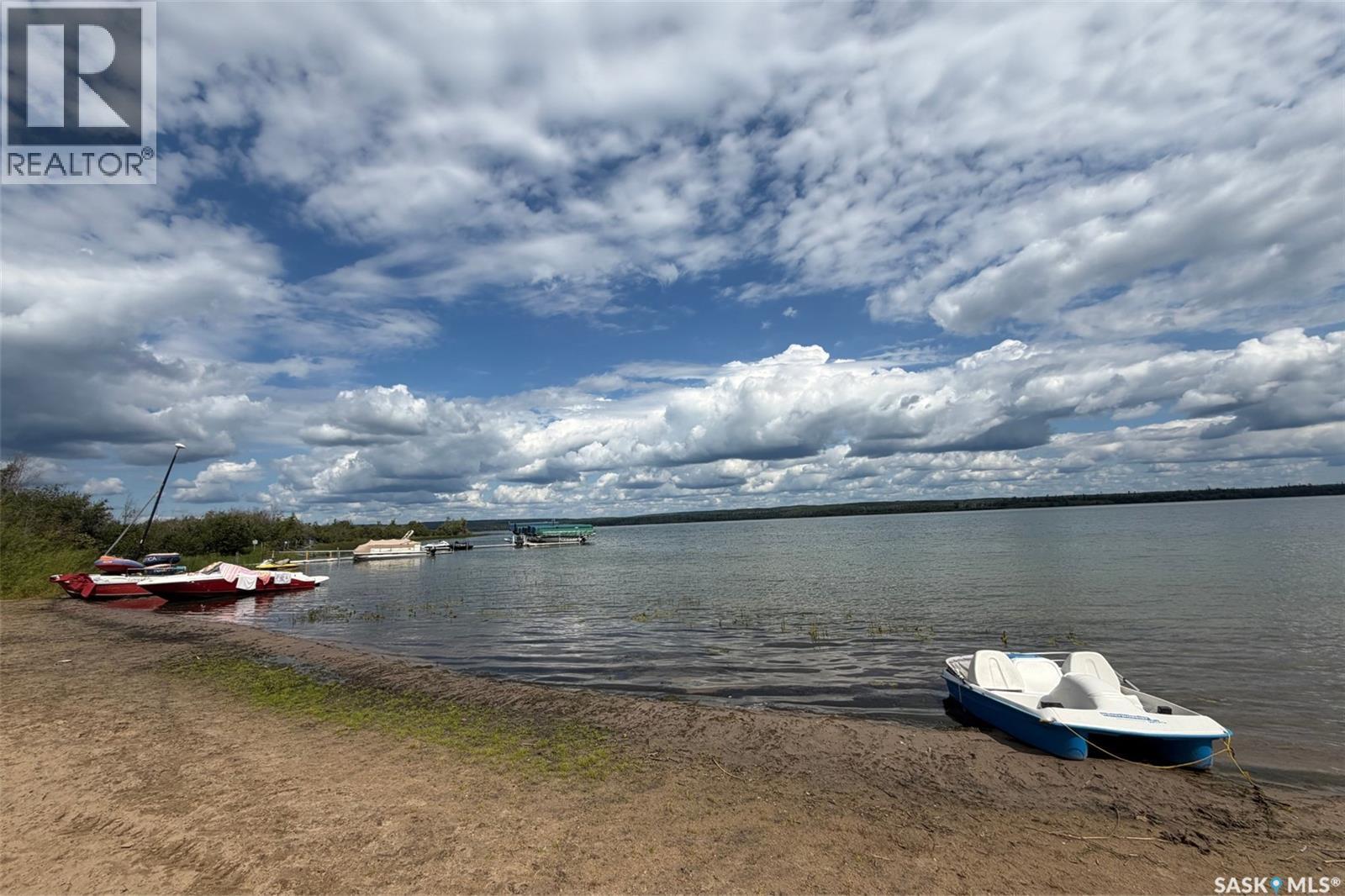 303 Christel Crescent, Lac Des Îles, SK - Outdoor With Body Of Water With View