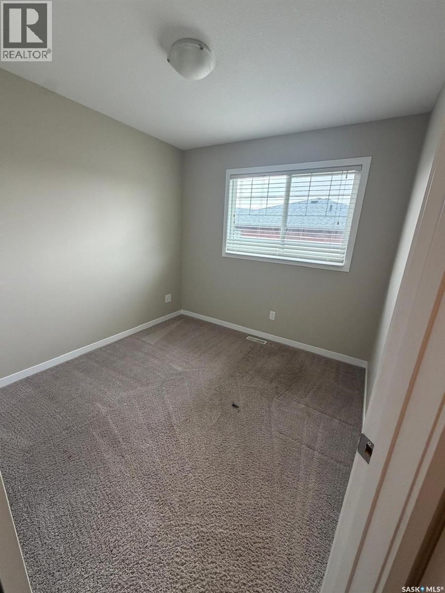 604 3440 Avonhurst Drive, Regina, SK - Indoor Photo Showing Other Room