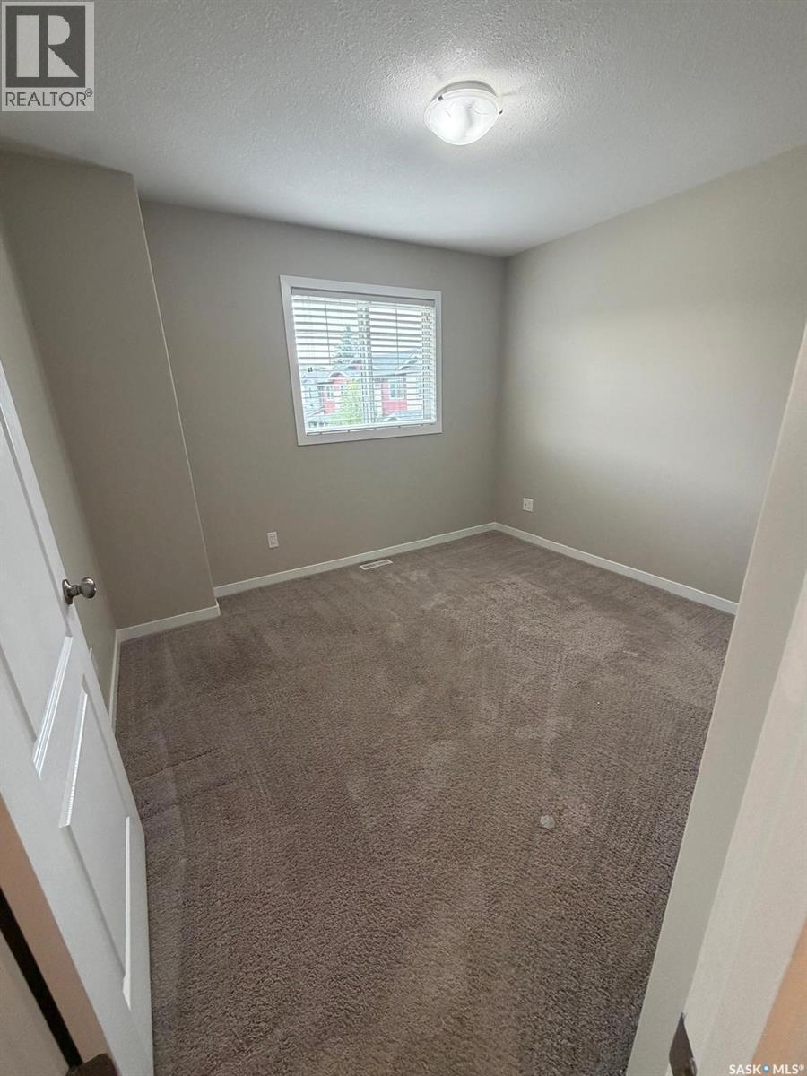 604 3440 Avonhurst Drive, Regina, SK - Indoor Photo Showing Other Room