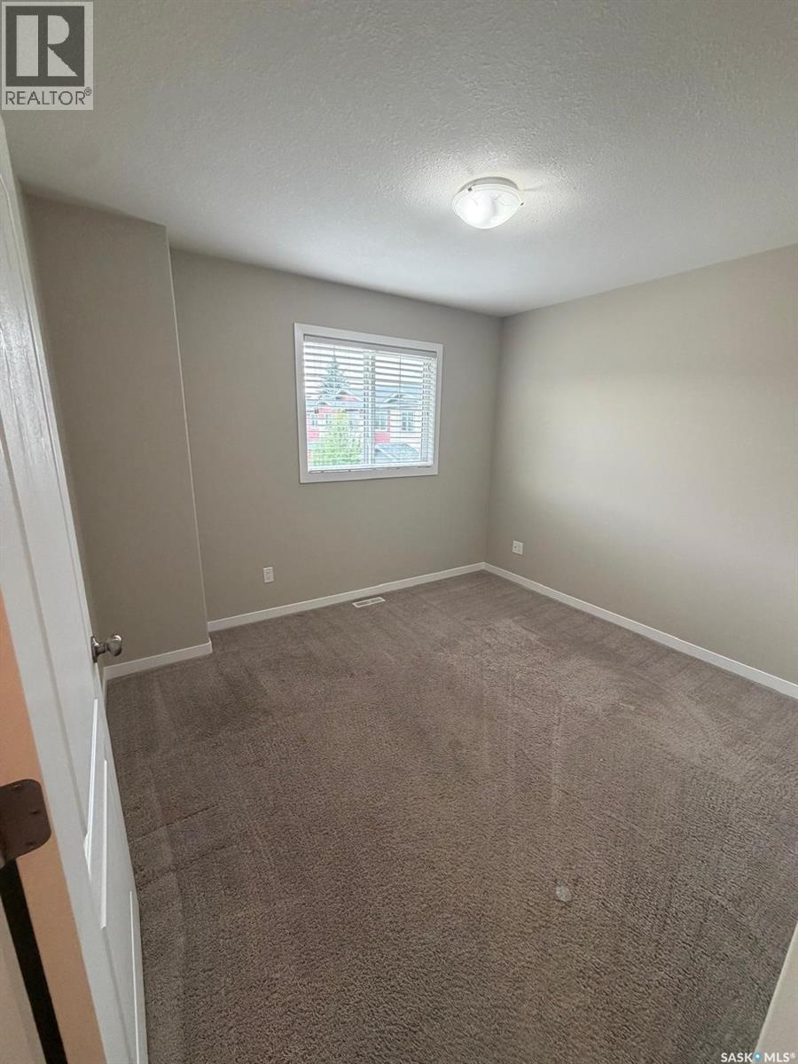 604 3440 Avonhurst Drive, Regina, SK - Indoor Photo Showing Other Room