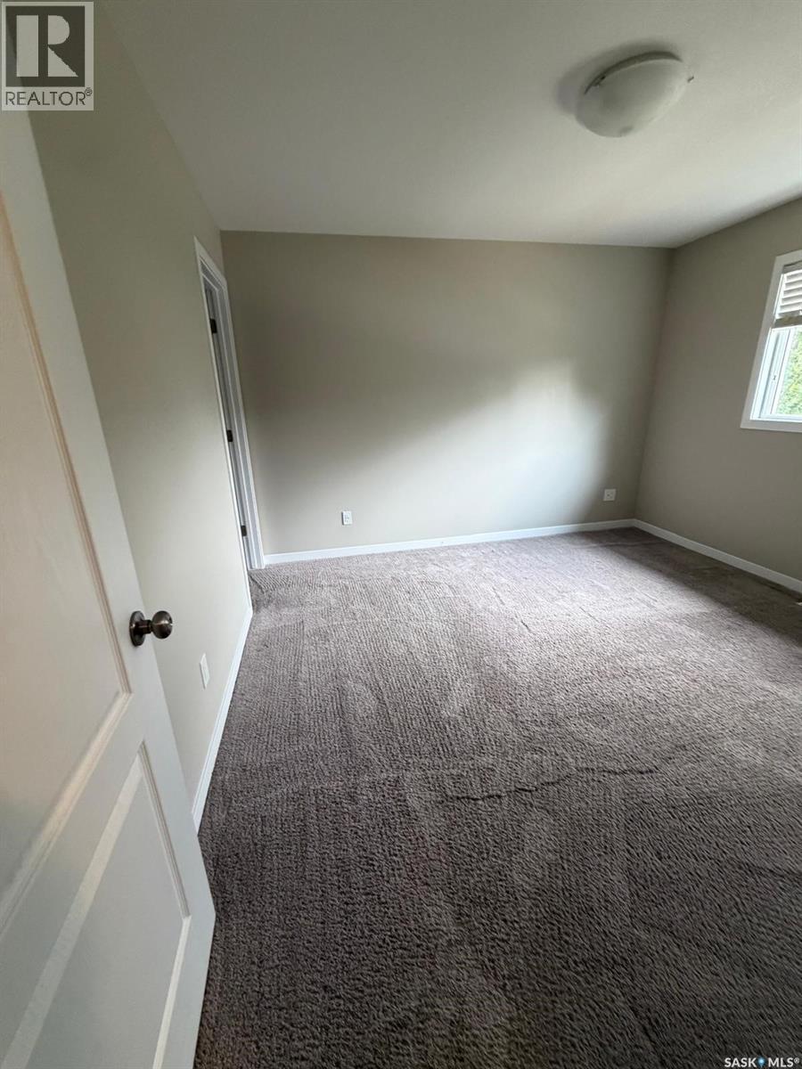 604 3440 Avonhurst Drive, Regina, SK - Indoor Photo Showing Other Room
