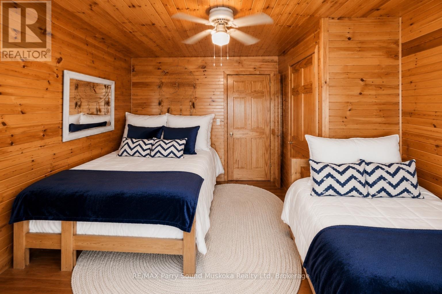 587 Centre Road, Mckellar, ON - Indoor Photo Showing Bedroom