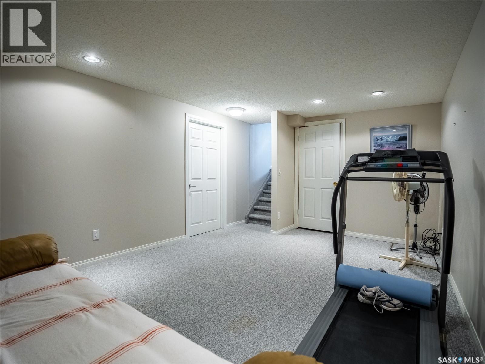 15 Dickinson Crescent, Regina, SK - Indoor Photo Showing Gym Room