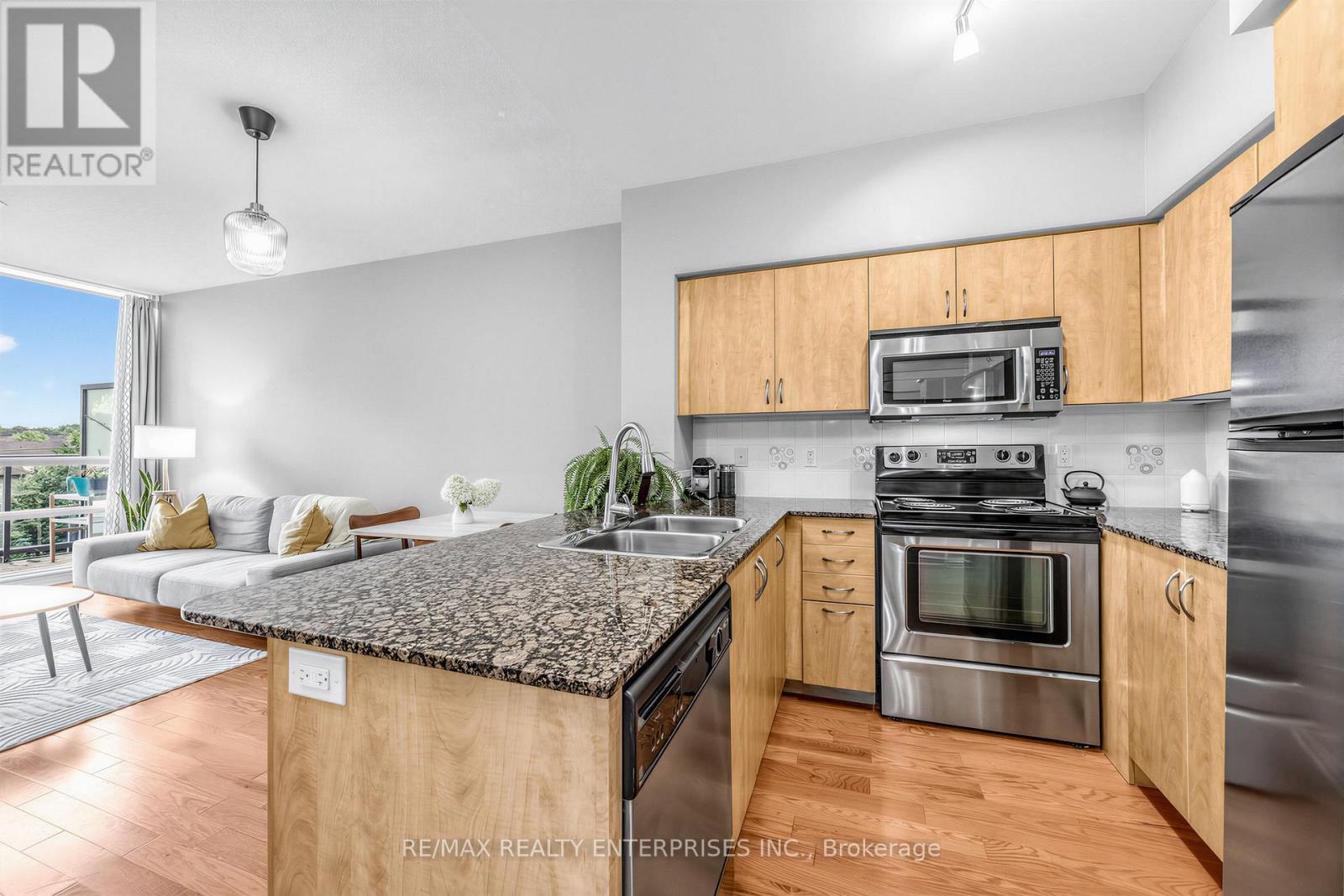 304 - 15 Legion Road, Toronto, ON - Indoor Photo Showing Kitchen With Stainless Steel Kitchen With Double Sink