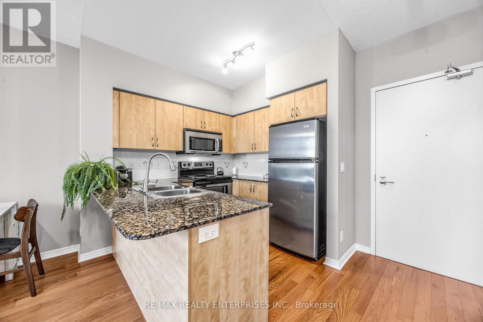 304 - 15 Legion Road, Toronto, ON - Indoor Photo Showing Kitchen With Stainless Steel Kitchen With Double Sink
