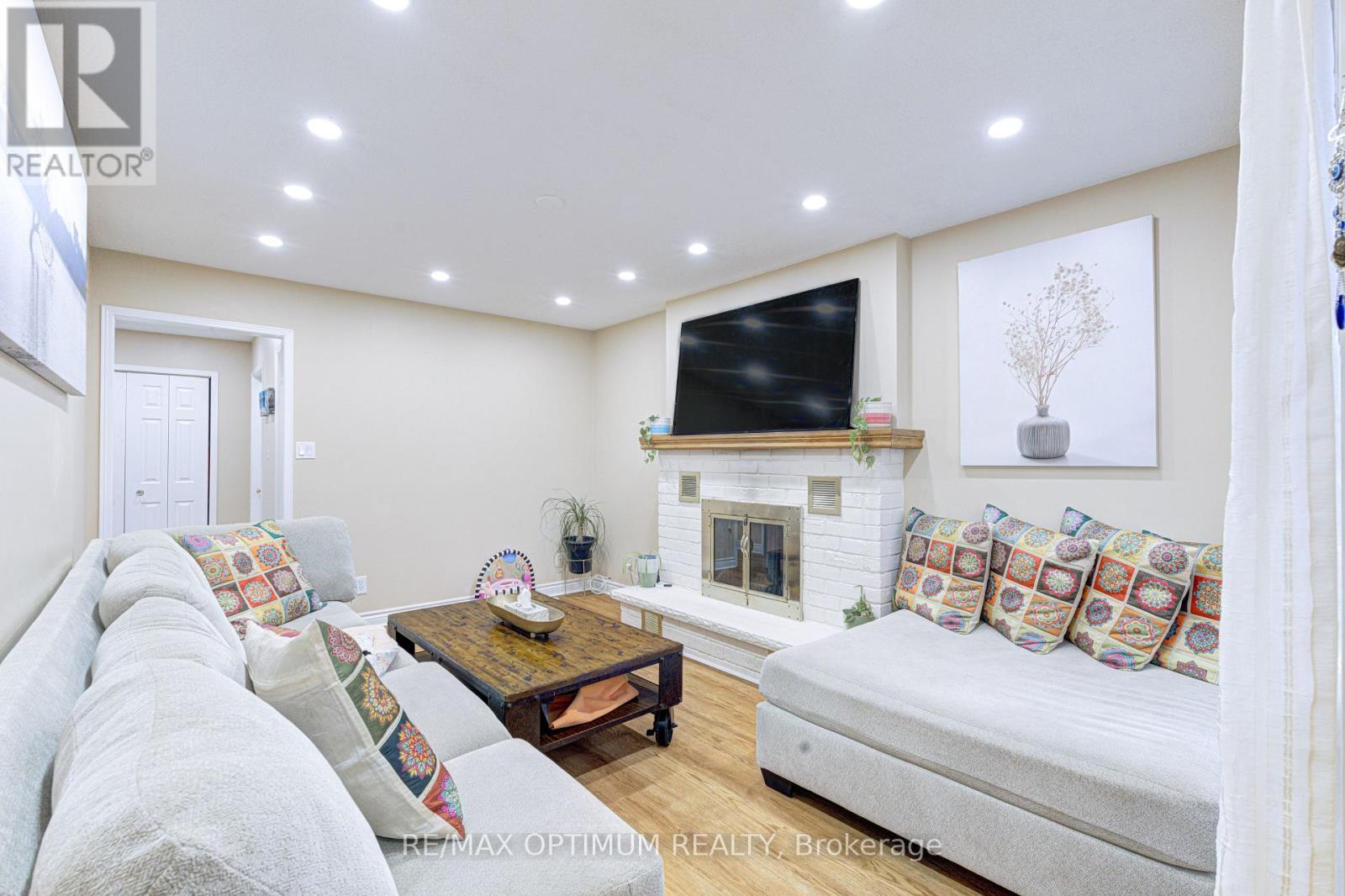 11 Murkar Crescent, Whitby, ON - Indoor With Fireplace