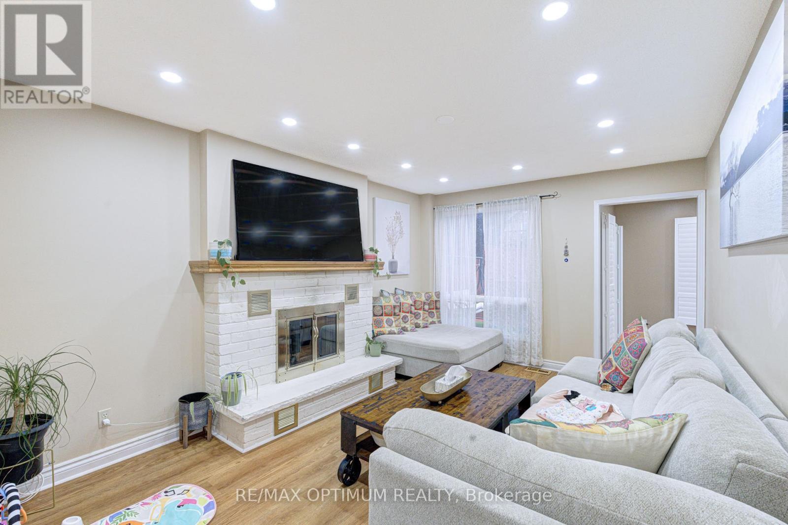 11 Murkar Crescent, Whitby, ON - Indoor Photo Showing Living Room With Fireplace