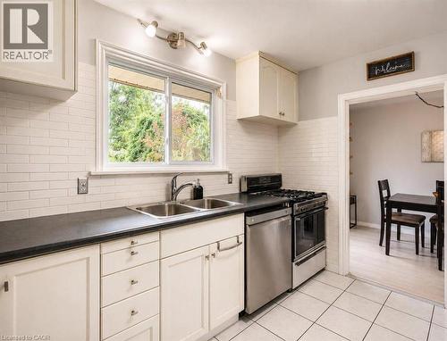 120 Stone Church Road W, Hamilton, ON - Indoor Photo Showing Kitchen With Double Sink