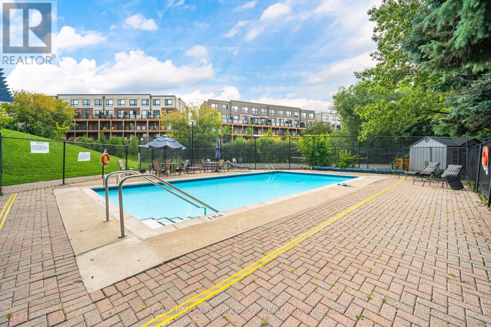 1406 - 600 Rexdale Boulevard, Toronto, ON - Outdoor With In Ground Pool