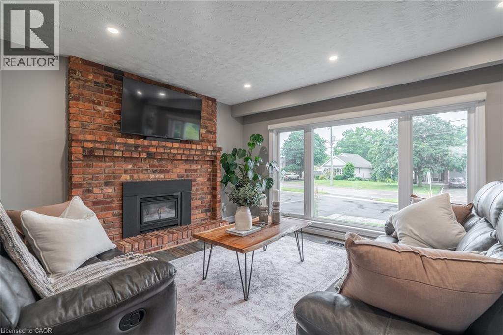 368 Caithness Street, Caledonia, ON - Indoor Photo Showing Living Room With Fireplace