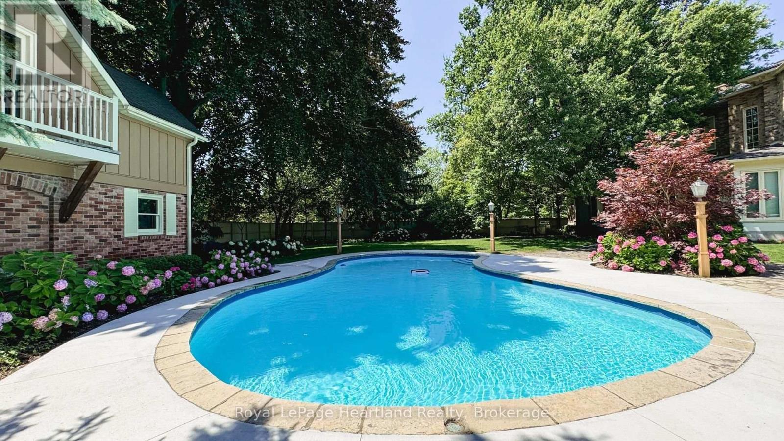 100 - 5 Cobourg Street, Goderich (Goderich (Town)), ON - Outdoor With In Ground Pool With Backyard