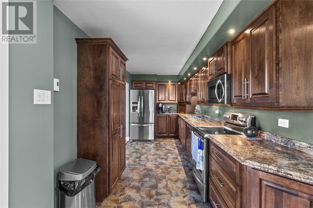 255 Corporal Jamie Murphy Drive, Conception Harbour, NL - Indoor Photo Showing Kitchen With Double Sink