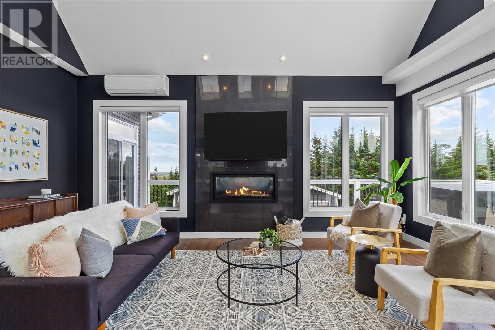 28 Flora Drive, Torbay, NL - Indoor Photo Showing Living Room With Fireplace
