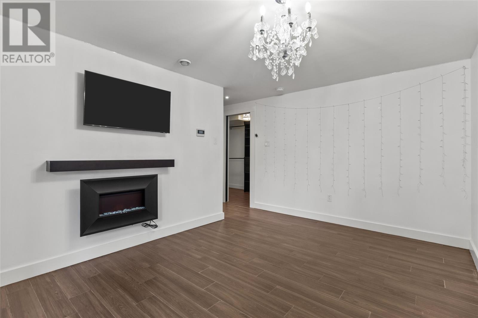 28 Flora Drive, Torbay, NL - Indoor Photo Showing Living Room With Fireplace